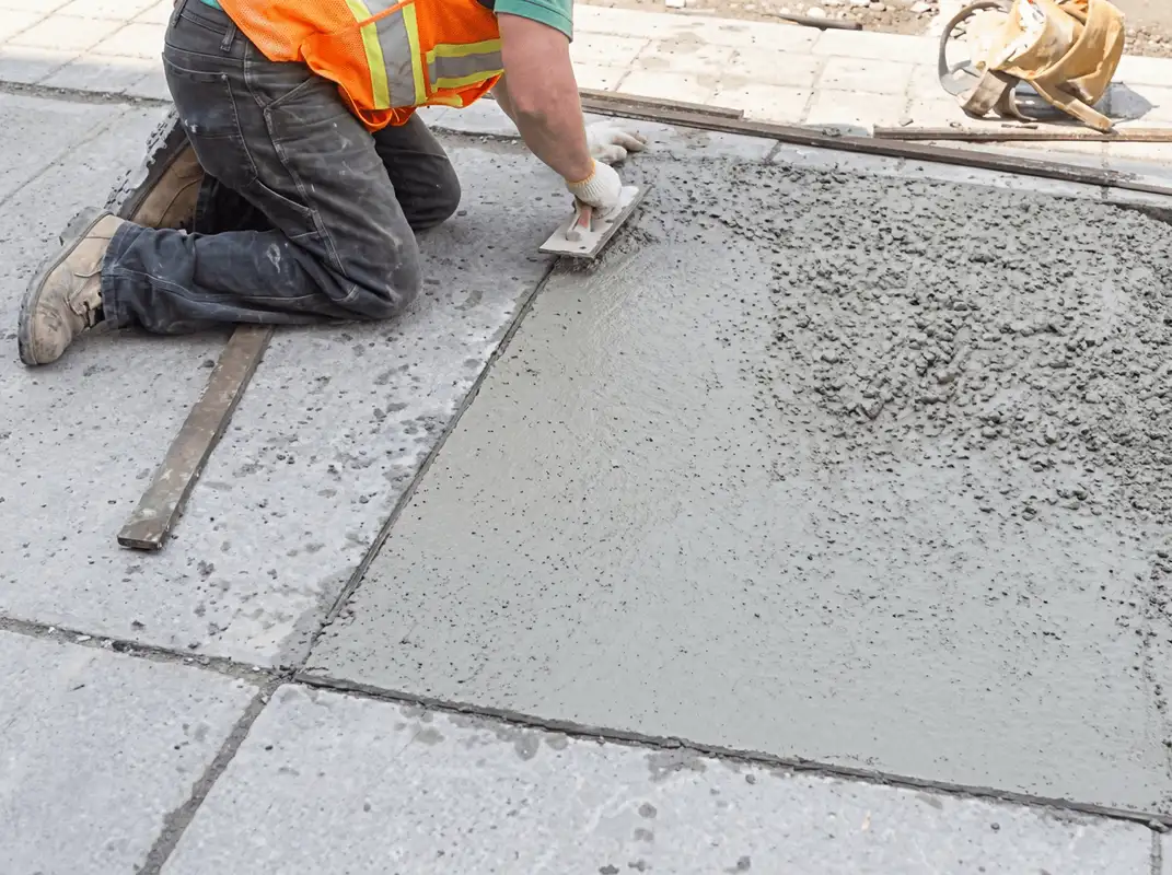 Professional repairing a concrete floor in Peoria, IL